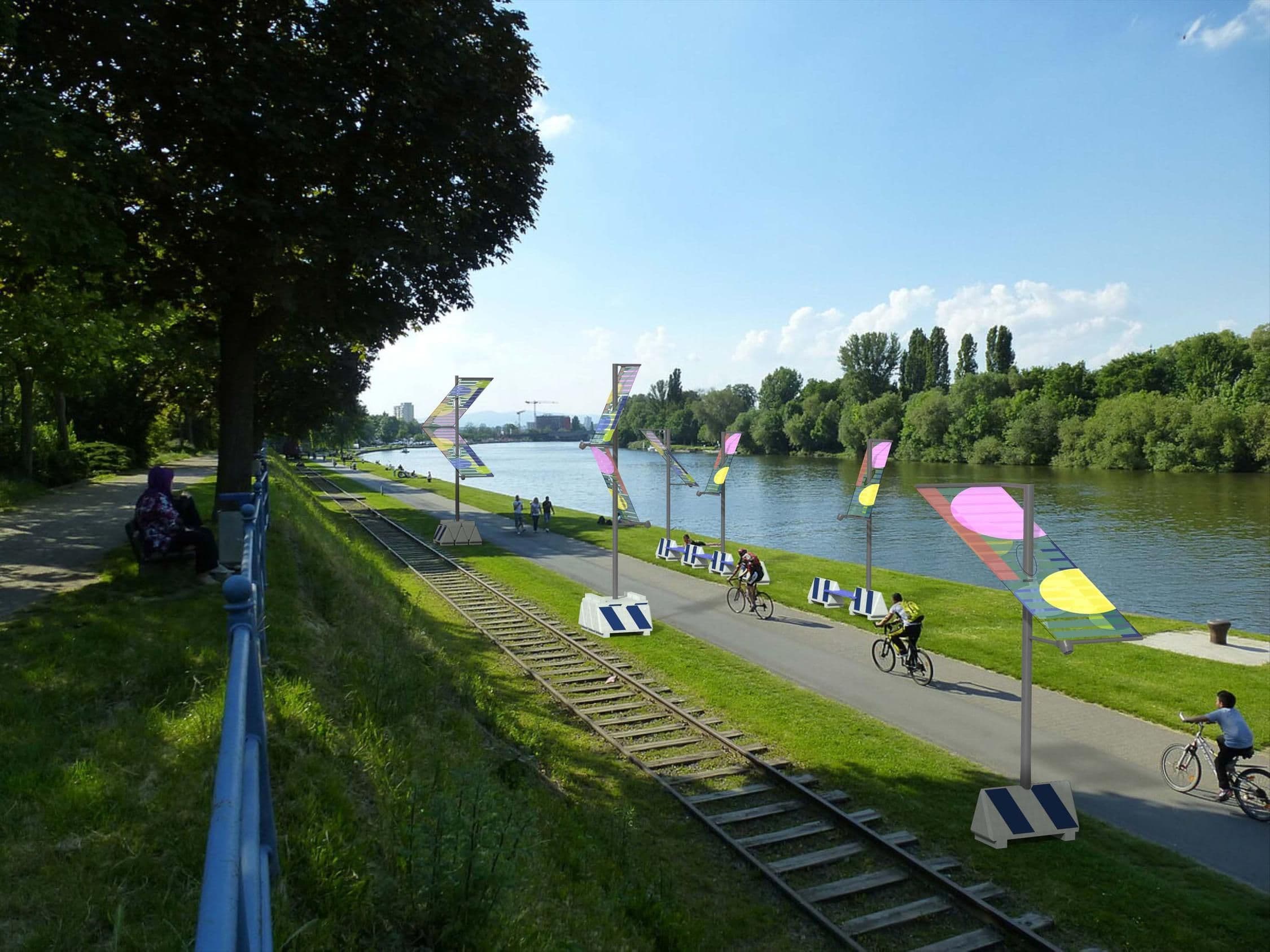Am Radweg zwischen Frankfurt und Offenbach stehen große, bunte Leuchten.